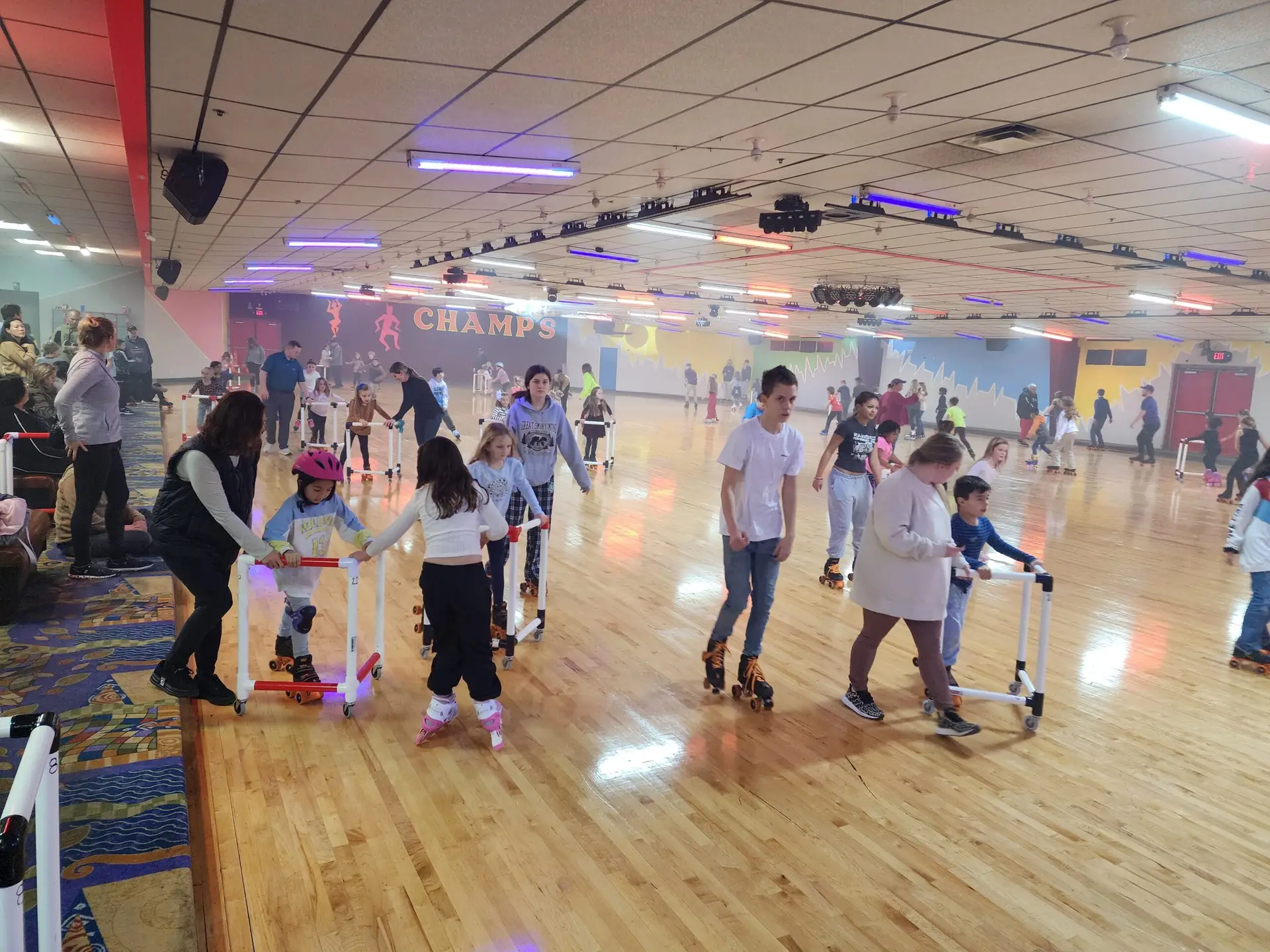 Children and families enjoying roller skating event